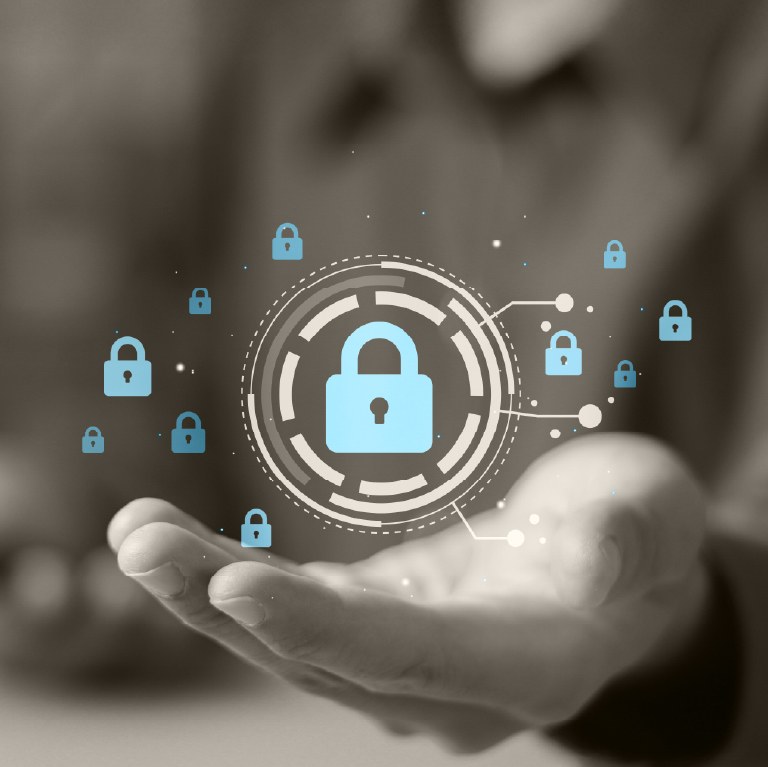 hands under a digital security lock hologram